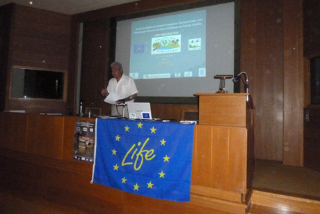 Professor K. Georghiou presenting the report of the UoA. (Photo: Christos Georgiadis)